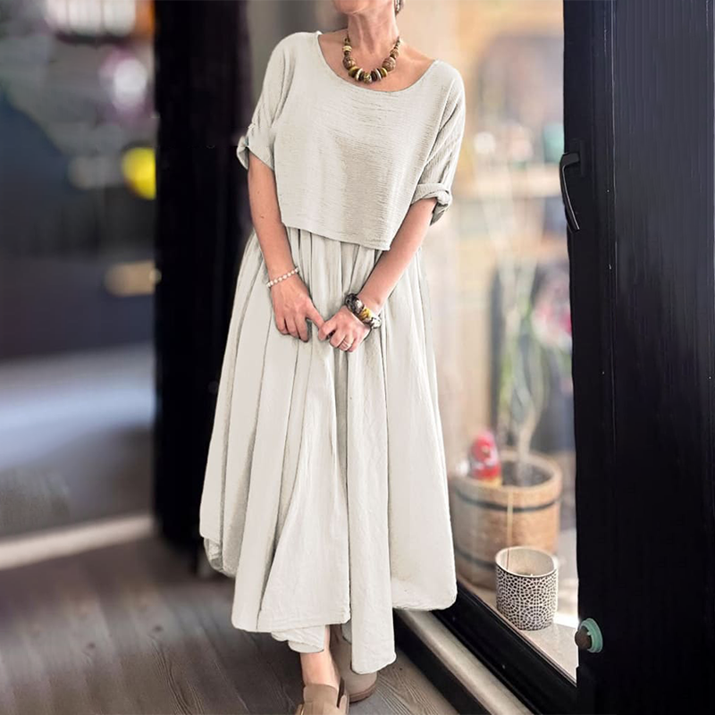 đâšBekvĂ€mt och elegant tvĂ„delat set med blus med rund hals och kjol i bomull och linne för kvinnor