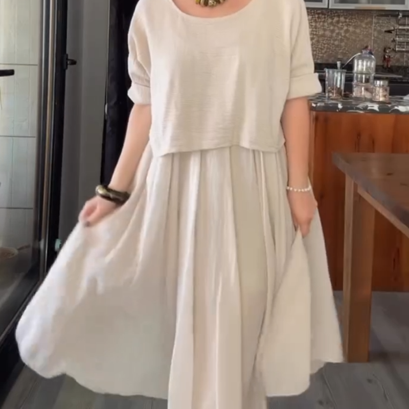 đâšBekvĂ€mt och elegant tvĂ„delat set med blus med rund hals och kjol i bomull och linne för kvinnor