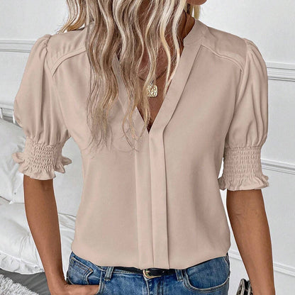 Blusa feminina elegante com decote em V e mangas bufantes