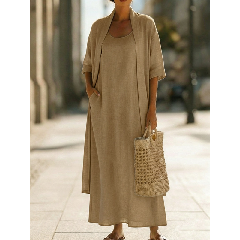 👗✨ Conjunto feminino de vestido maxi com cardigan leve que combina elegância e conforto diário