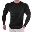 CAMISETA ESPORTIVA DE MANGA LONGA COM CORPO MARCADO, DE COR LISA, PARA HOMEM