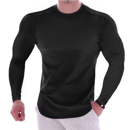 CAMISETA ESPORTIVA DE MANGA LONGA COM CORPO MARCADO, DE COR LISA, PARA HOMEM