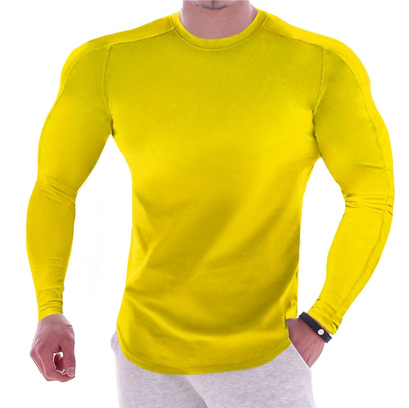 CAMISETA ESPORTIVA DE MANGA LONGA COM CORPO MARCADO, DE COR LISA, PARA HOMEM