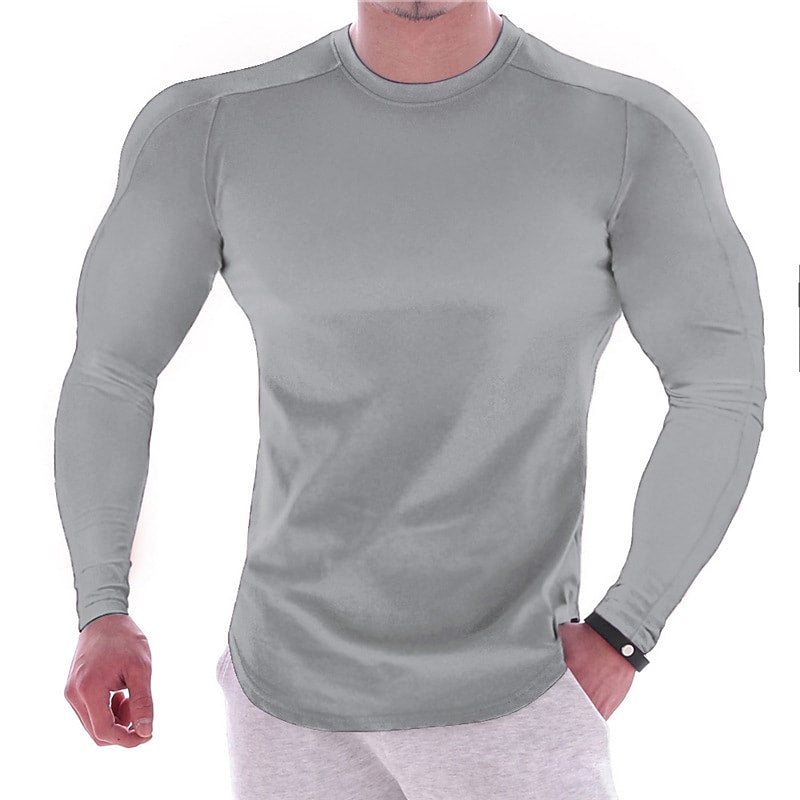CAMISETA ESPORTIVA DE MANGA LONGA COM CORPO MARCADO, DE COR LISA, PARA HOMEM